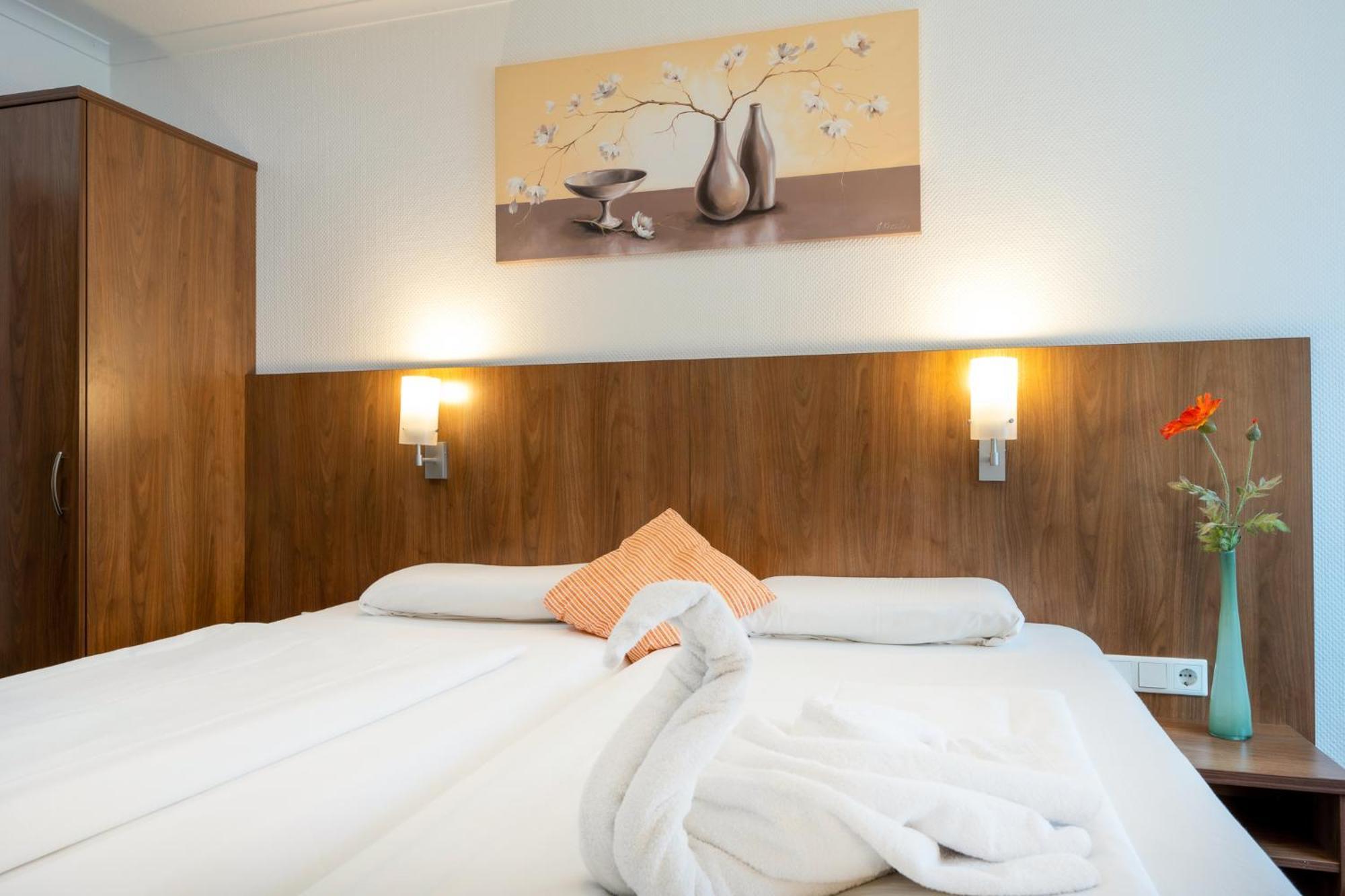 Triton Hotell Köln Rum bild